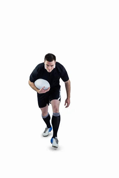 Jogador correndo com a bola de rugby — Fotografia de Stock