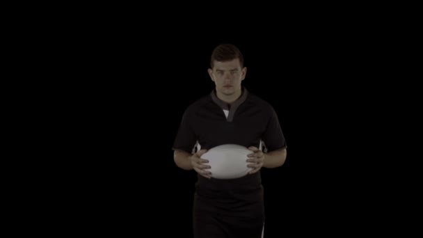 Серьезный игрок в регби с мячом — стоковое видео