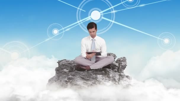 Businessman using tablet in the clouds — Stock Video