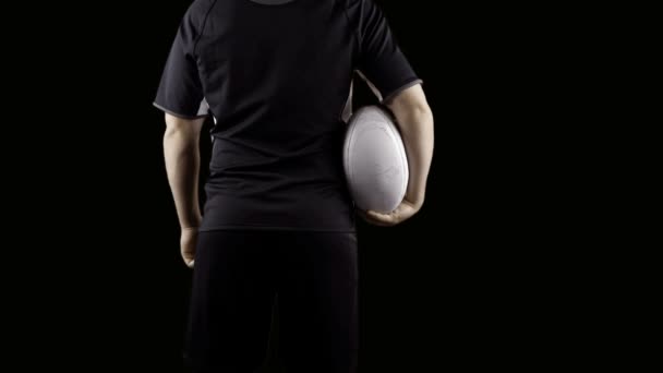 Serious rugby player with ball — Stock Video