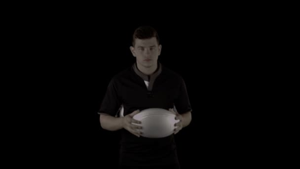 Serious rugby player with ball — Stock Video