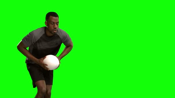 Jugador de rugby serio intento de puntuación — Vídeo de stock