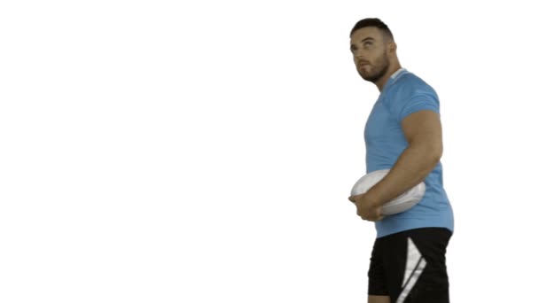 Serious rugby player holding ball — Stock Video