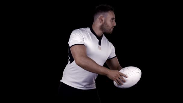 Serious rugby player with ball — Stock Video