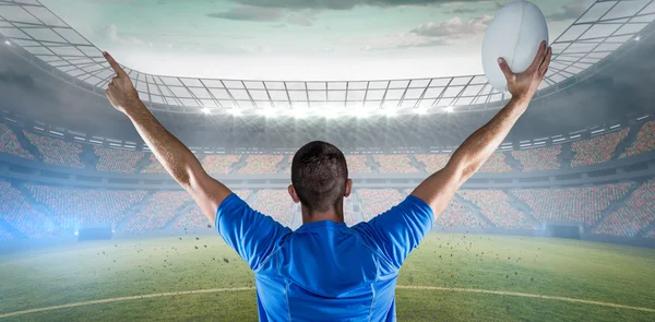 Rugby player holding ball — Stock Photo, Image