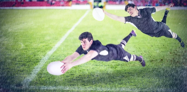 Giocatore di rugby segnando una meta — Foto Stock