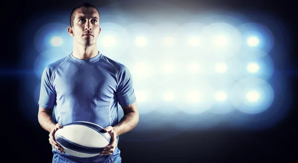 Rugby player holding ball — Stock Photo, Image