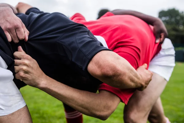 Jogadores fazendo um scrum — Fotografia de Stock