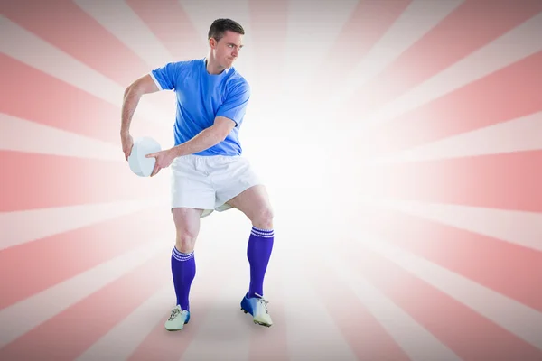 Player about to throw a rugby ball — Stock Photo, Image