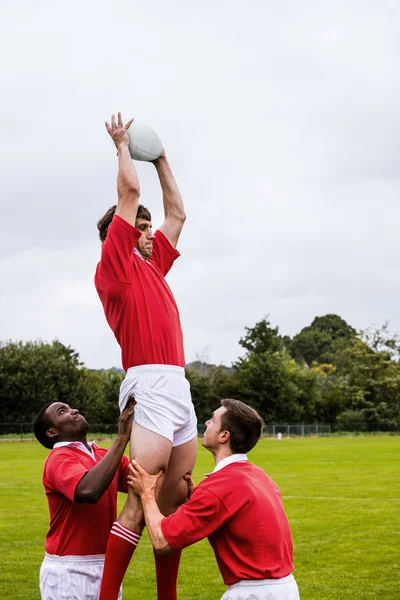 Rugbyspelers springen — Stockfoto