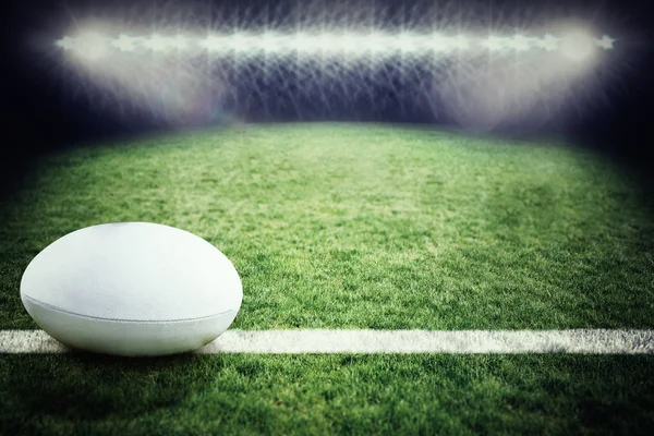 Ball against rugby pitch — Stock Photo, Image