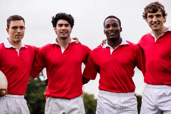 Jogadores sorrindo para a câmera — Fotografia de Stock