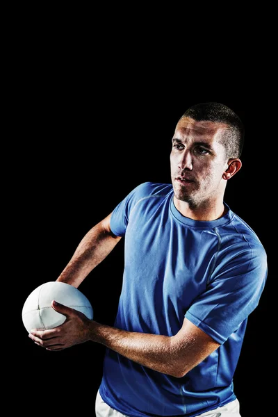 Jugador de rugby sosteniendo pelota — Foto de Stock