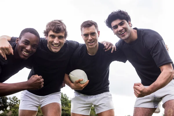 Rugby hráči společně jásají — Stock fotografie