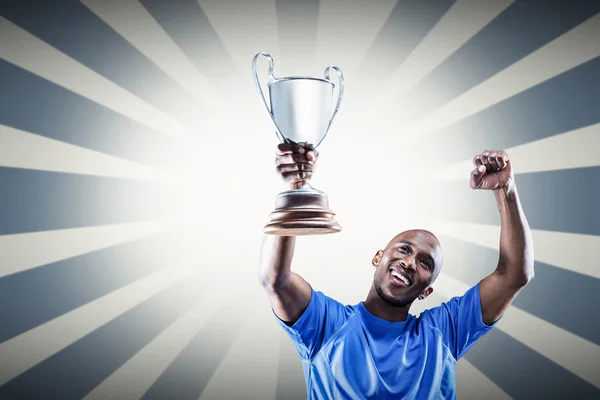 Sportsman looking up and cheering — Stock Photo, Image