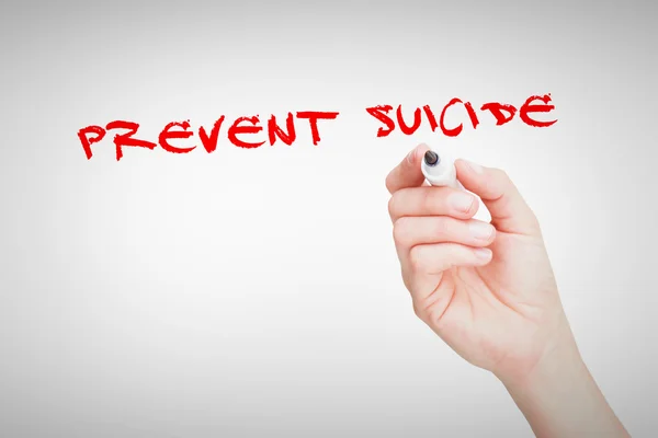 Prevent suicide words against  hand — Stock Photo, Image