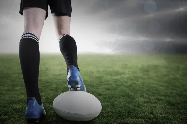 Player posing foot on the ball — Stock Photo, Image