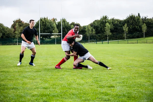 Jugadores de rugby jugando un partido — Foto de Stock