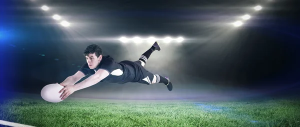 Rugby player scoring a try — Stock Photo, Image