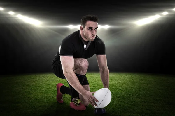 Player getting ready to kick ball — Stock Photo, Image