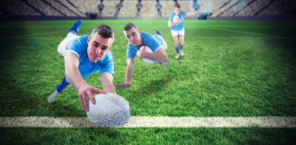 Rugby spiller scorer et forsøk – stockfoto
