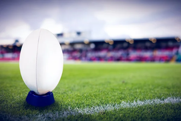 Rugby ball against pitch — Stock Photo, Image