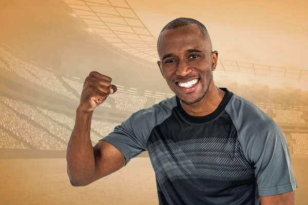 Sportsman cheering after success — Stock Photo, Image