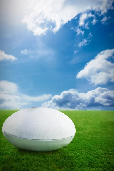 Rugby ball against blue sky — Stock Photo, Image