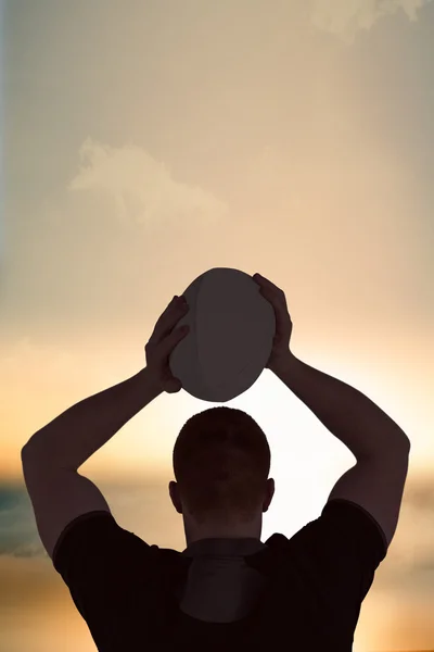 Player about to throw a rugby ball — Stock Photo, Image