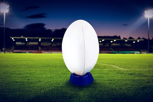 Rugby ball against pitch — Stock Photo, Image