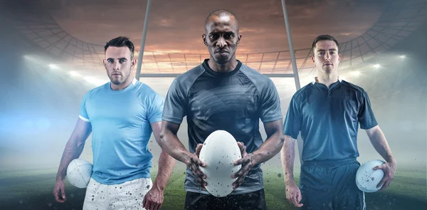 Jugadores con pelotas de rugby —  Fotos de Stock