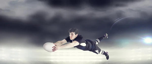 Rugby player scoring a try — Stock Photo, Image