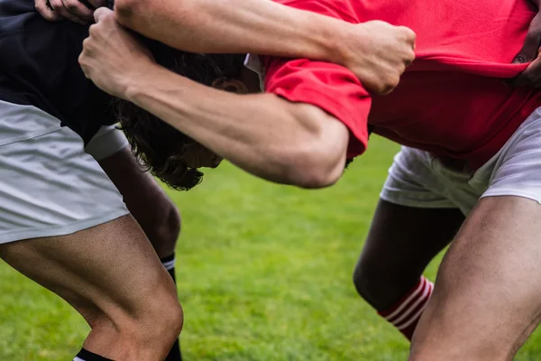 Rugby players doing a scrum — Stock Photo, Image