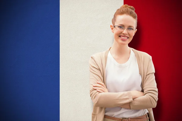 Composite image of smiling teacher — Stock Photo, Image