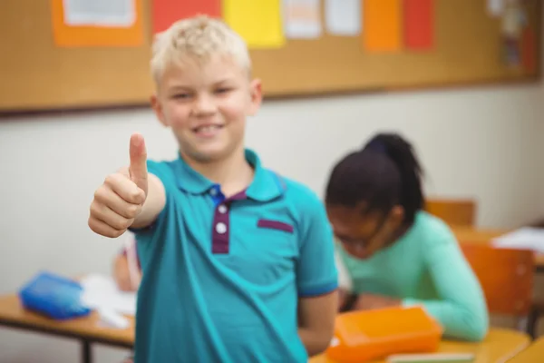 Lachende student met Duimschroef opwaarts — Stockfoto