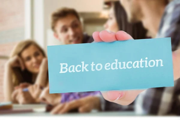 Back to education against smiling friends students talking together — Stock Photo, Image