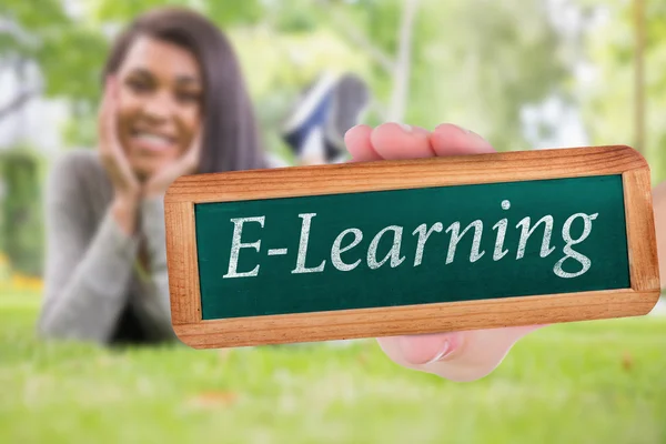 Word e-learning and hand showing chalkboard — Stock Photo, Image