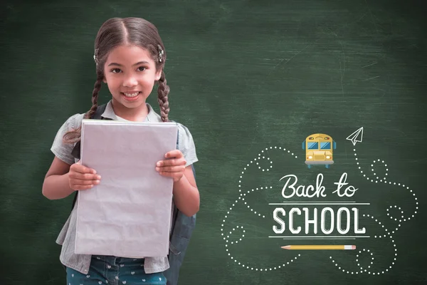 Cute pupil smiling at camera — Stock Photo, Image