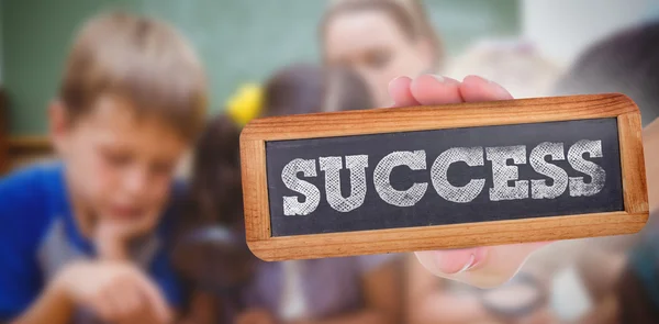 Słowo sukces i strony Wyświetlono tablica — Zdjęcie stockowe