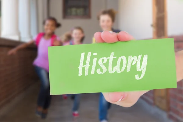 Word history and hand showing card — Stock Photo, Image