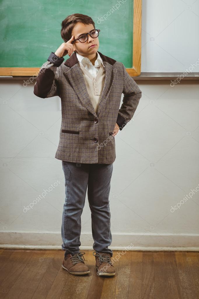 Pupil dressed up as teacher thinking — Stock Photo © Wavebreakmedia