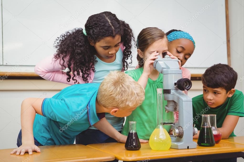 Students using science beakers — Stock Photo © Wavebreakmedia 84693742