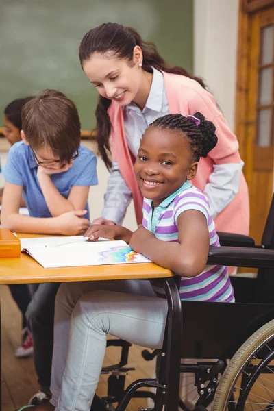 Disabled pupil smiling at camera — Stock Photo, Image