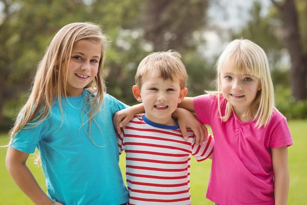 Classmates with arms around each other — Stock Photo, Image