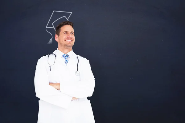 Handsome doctor with arms crossed — Stock Photo, Image