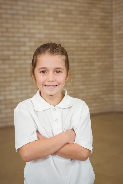 Happy pupil with folded arms — Stock Photo, Image
