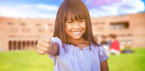 Girl against students using laptop in lawn — Stock Photo, Image