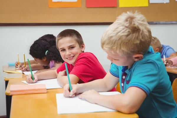 Pupils working at school work — Stock Photo, Image