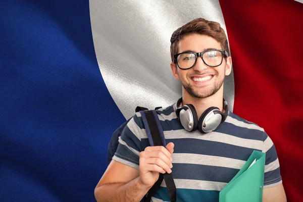 Student przed francuska Flaga narodowa — Zdjęcie stockowe