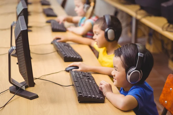 Cute pupils in computer class — Stock Photo, Image